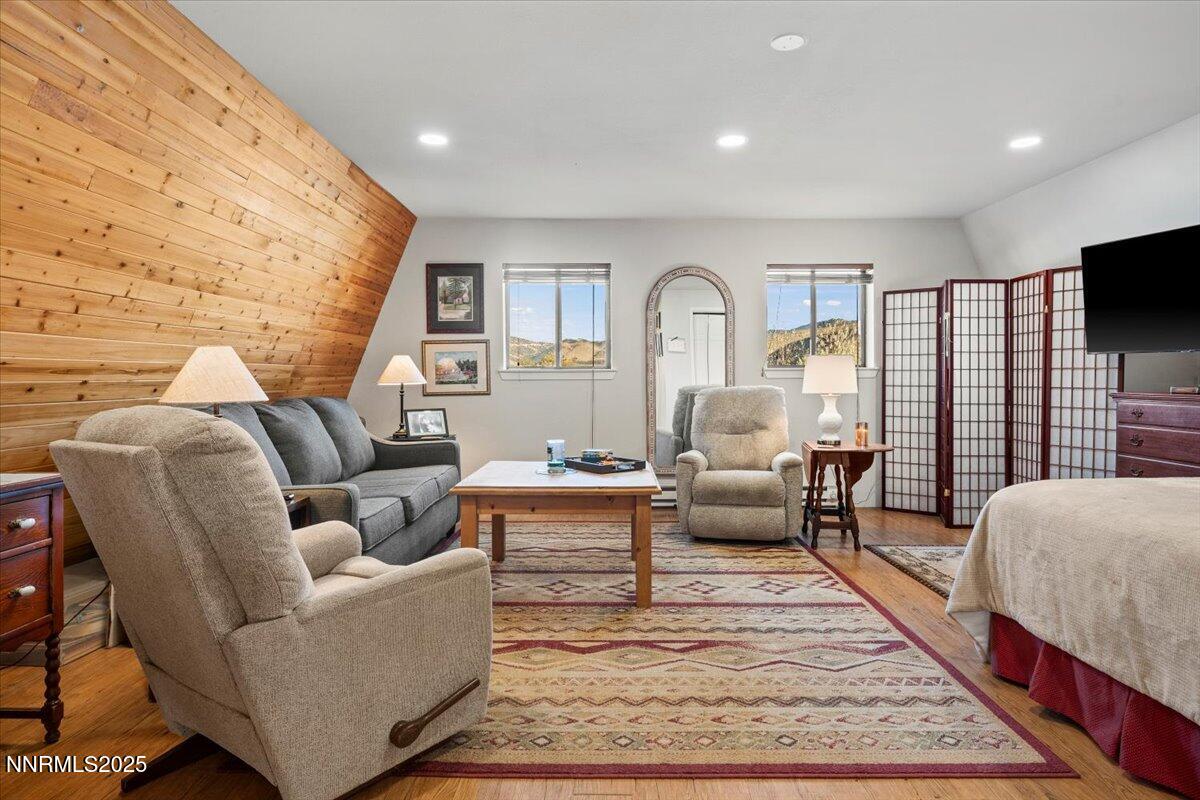 20855 Ames Lane Reno, NV 89521 - Photo 41 of 66 a living room with furniture and a rug