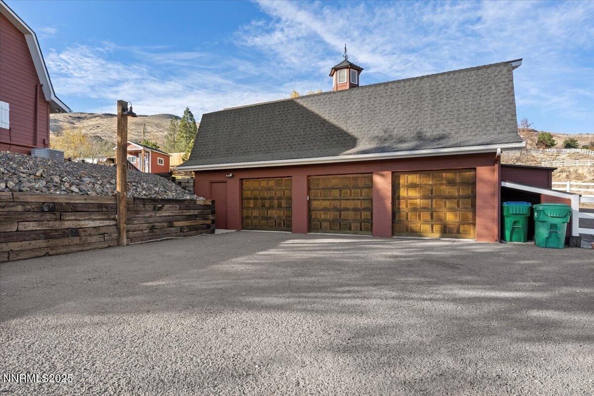 20855 Ames Lane Reno, NV 89521 - Photo 60 of 66 a couple of cars parked in front of a house