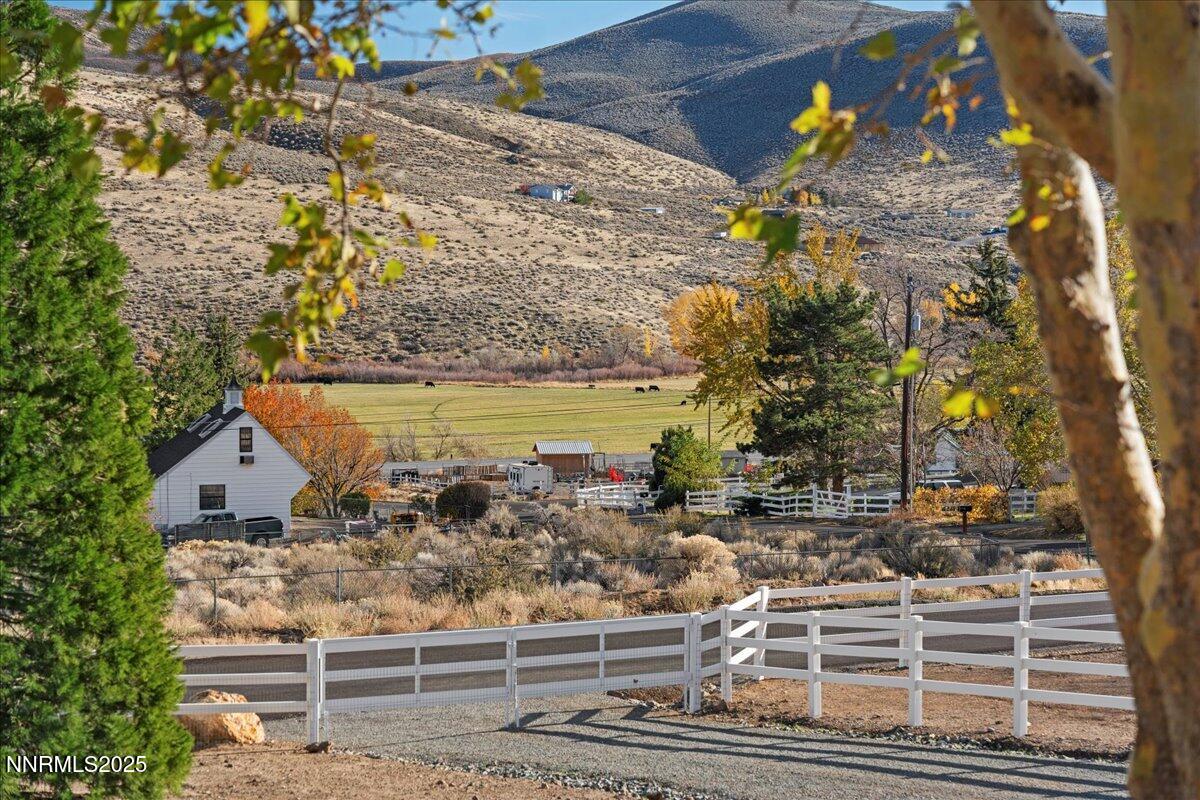 20855 Ames Lane Reno, NV 89521 - Photo 6 of 66 a view of a yard with wooden fence