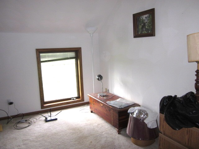 16169 Anderson Road Durand, IL 61024 - Photo 12 of 25 a room with a bed and a window