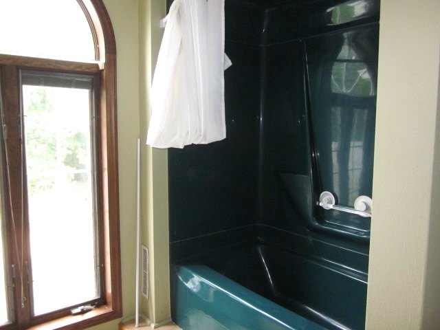 16169 Anderson Road Durand, IL 61024 - Photo 13 of 25 a bathroom with a bathtub