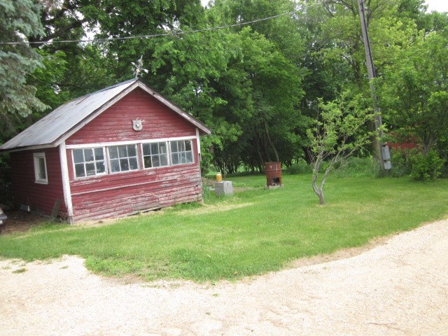 16169 Anderson Road Durand, IL 61024 - Photo 19 of 25 a front view of a house with a yard
