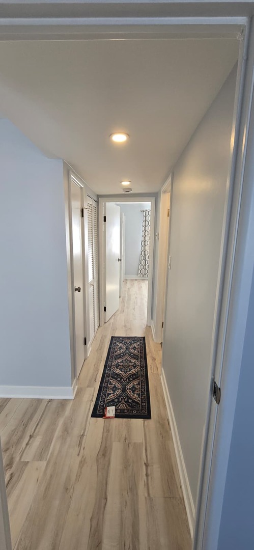 9475 Bay Colony Drive, Unit 3N Des Plaines, IL 60016 - Photo 8 of 14 a bathroom with a sink and a shower