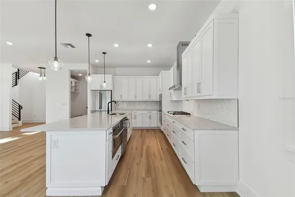 a view of entryway with wooden floor