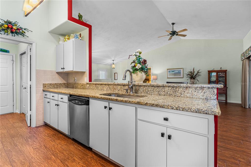 993 Appleview Way Port Orange, FL 32127 - Photo 12 of 46 a bathroom with a granite countertop sink and a mirror