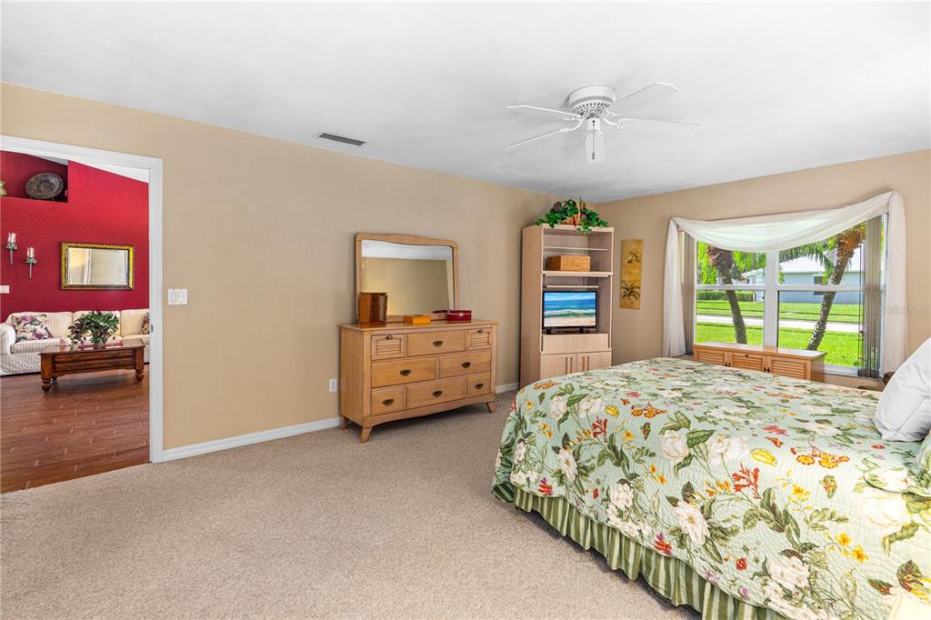 993 Appleview Way Port Orange, FL 32127 - Photo 16 of 46 a bed room with a bed and a tv