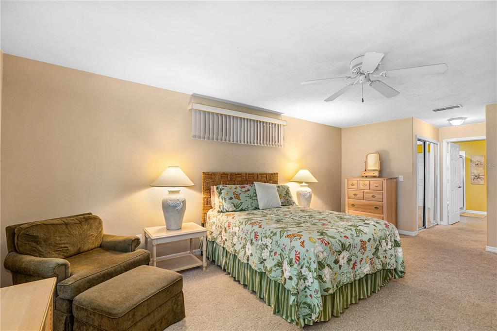 993 Appleview Way Port Orange, FL 32127 - Photo 18 of 46 a bedroom with a bed and a couch