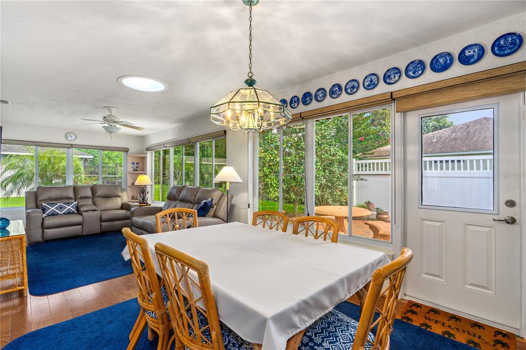 993 Appleview Way Port Orange, FL 32127 - Photo 28 of 46 a view of a dining room with furniture window and wooden floor