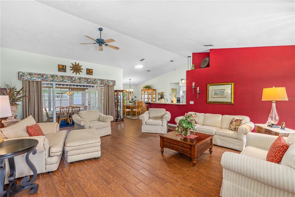 993 Appleview Way Port Orange, FL 32127 - Photo 6 of 46 a living room with furniture and wooden floor