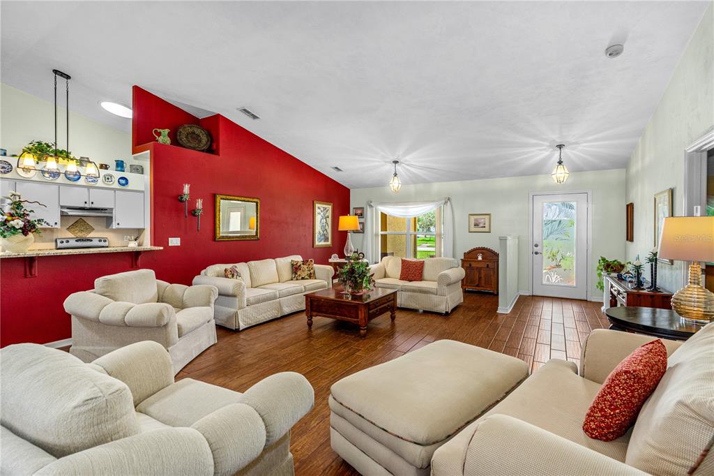 993 Appleview Way Port Orange, FL 32127 - Photo 8 of 46 a living room with furniture fireplace and a large window