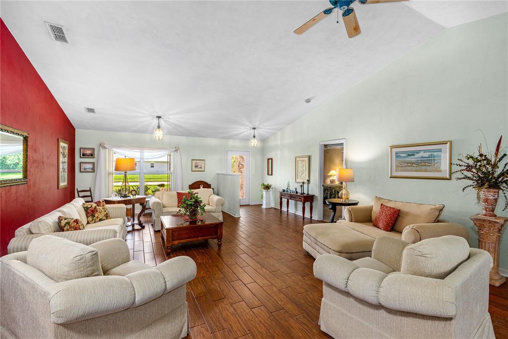 993 Appleview Way Port Orange, FL 32127 - Photo 9 of 46 a living room with furniture and a large window