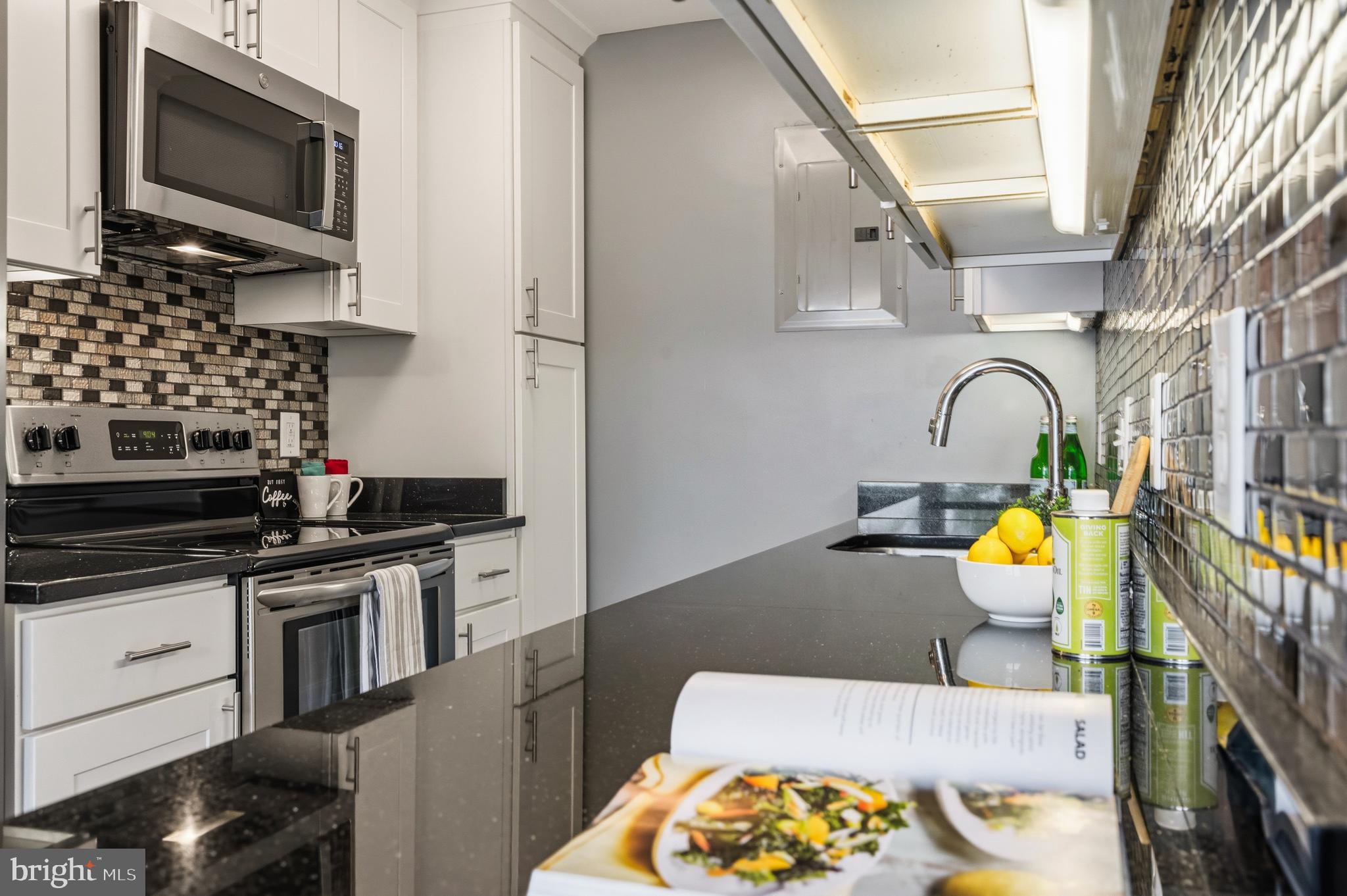 7034 Strathmore Street, Unit 306 Chevy Chase, MD 20815 - Photo 7 of 23 Kitchen