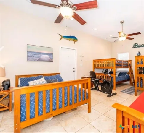 a view of a house with backyard porch and sitting area