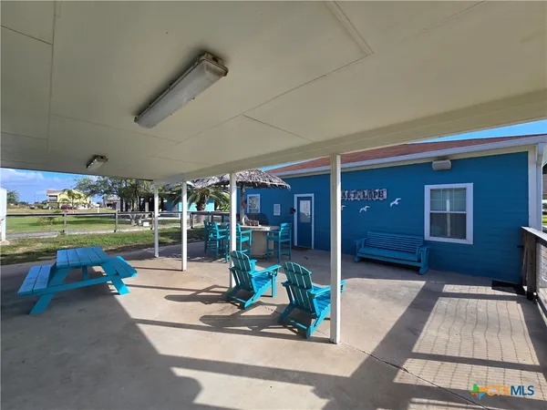 a view of a table and chairs in patio