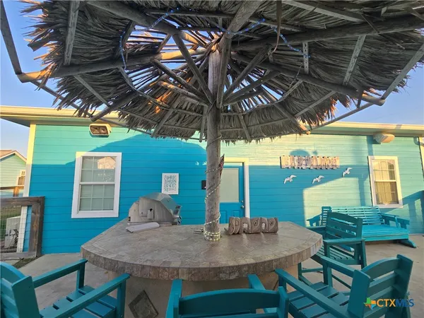 a view of a porch with furniture