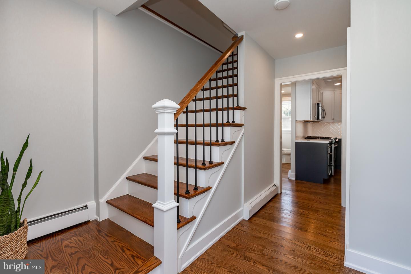 100 Bobbin Mill Road Media, PA 19063 - Photo 20 of 37 Hardwood Stairs w/New Wrought Iron Spindles