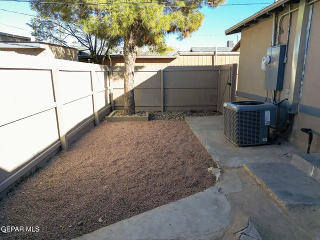 a view of balcony with furniture