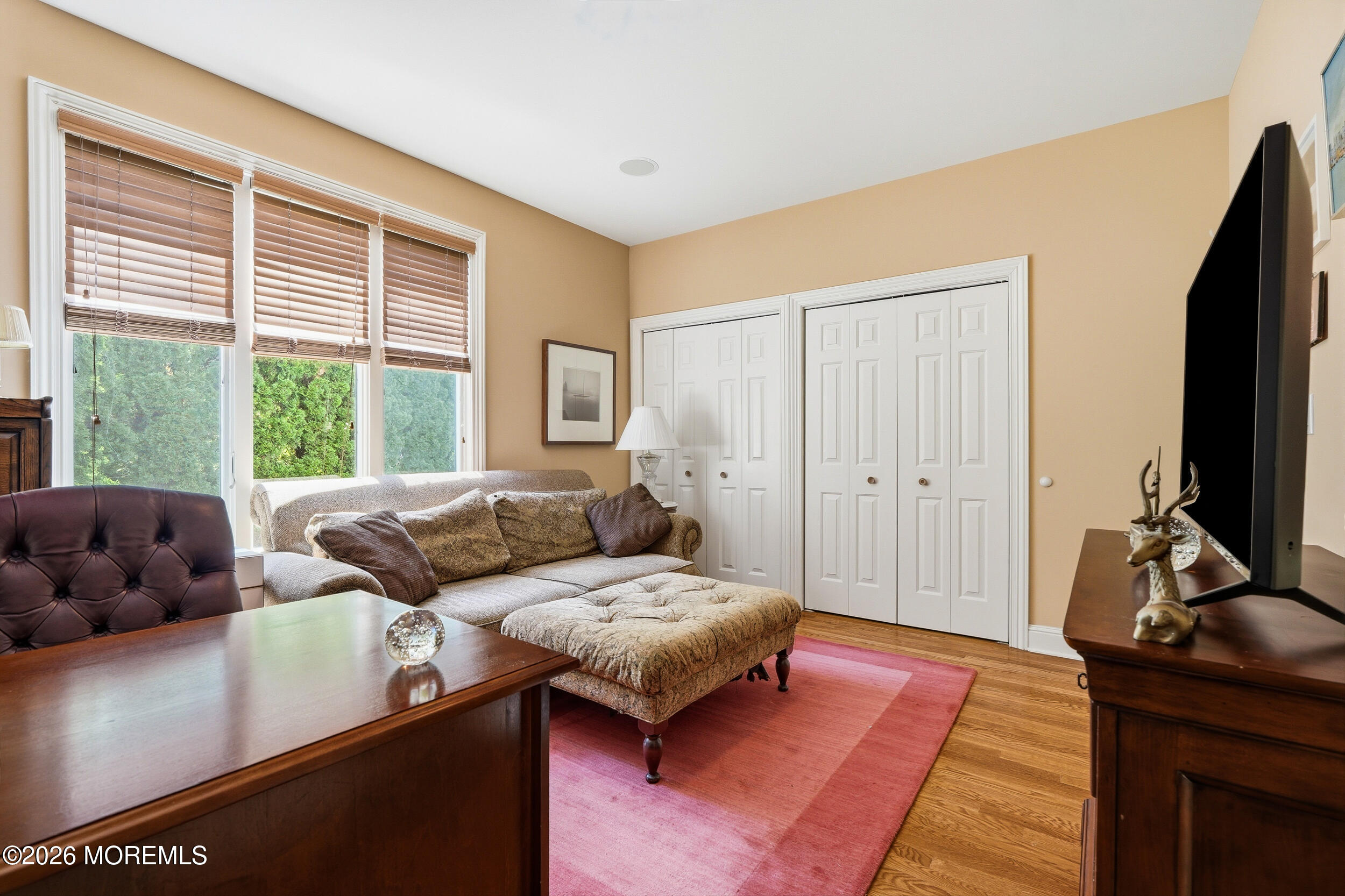 478 Rickey Lane Long Branch, NJ 07740 - Photo 39 of 64 a living room with furniture and a flat screen tv