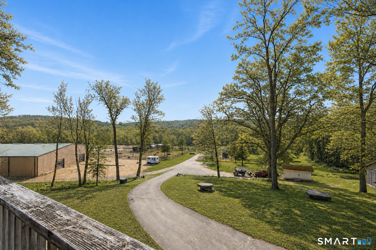 76 Cowles Road Woodbury, CT 06798 - Photo 1 of 1 Beautiful views from the 90' wrap around deck overlooking the 40 acre estate.