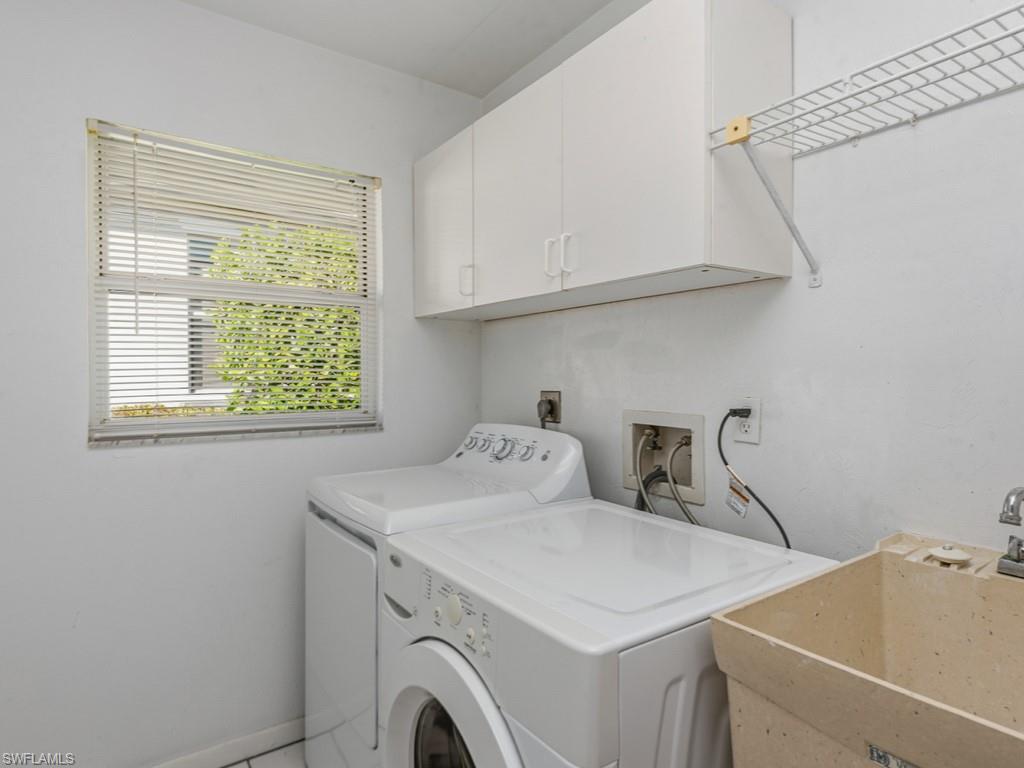 1081 Ruppert Road Marco Island, FL 34145 - Photo 26 of 39 a utility room with dryer and washer