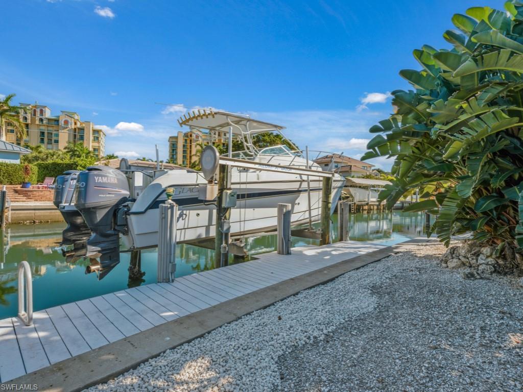 1081 Ruppert Road Marco Island, FL 34145 - Photo 30 of 39 a view of a house with a yard