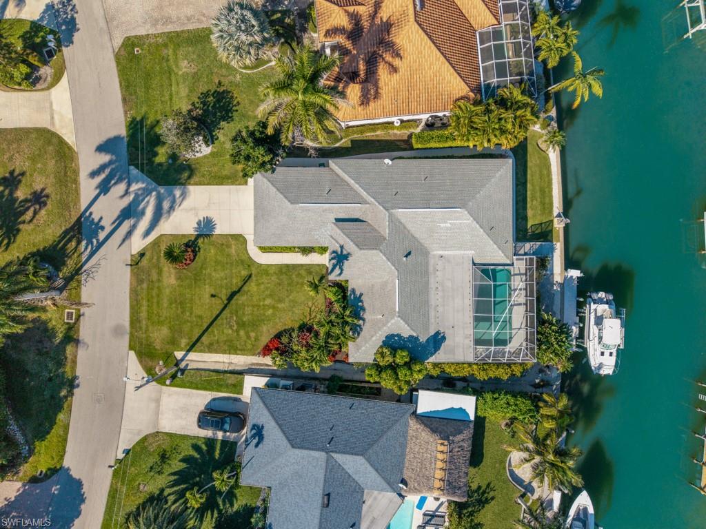 1081 Ruppert Road Marco Island, FL 34145 - Photo 31 of 39 an aerial view of a house with a garden