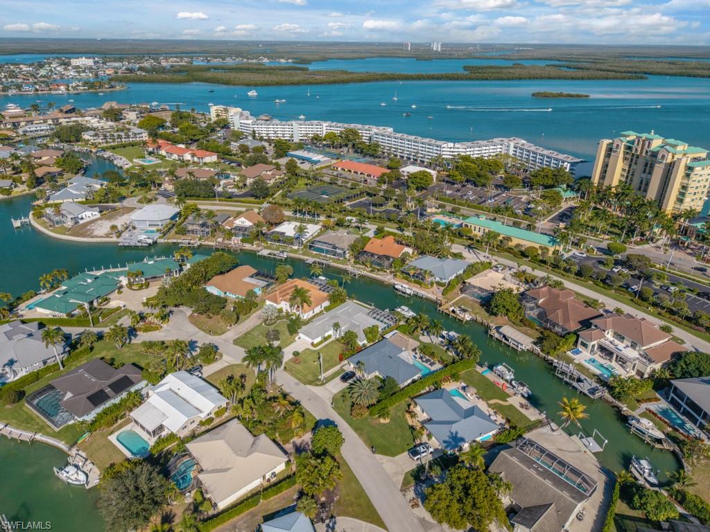 1081 Ruppert Road Marco Island, FL 34145 - Photo 33 of 39 a view of a lake with a city
