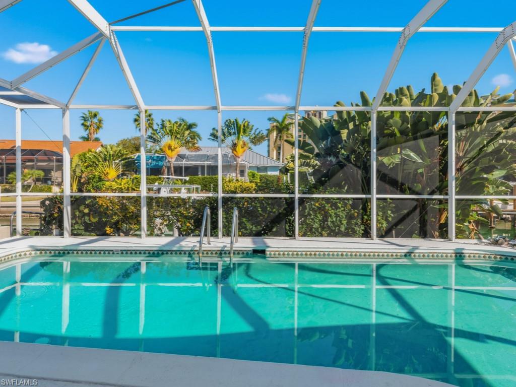 1081 Ruppert Road Marco Island, FL 34145 - Photo 37 of 39 a view of a house with a big yard