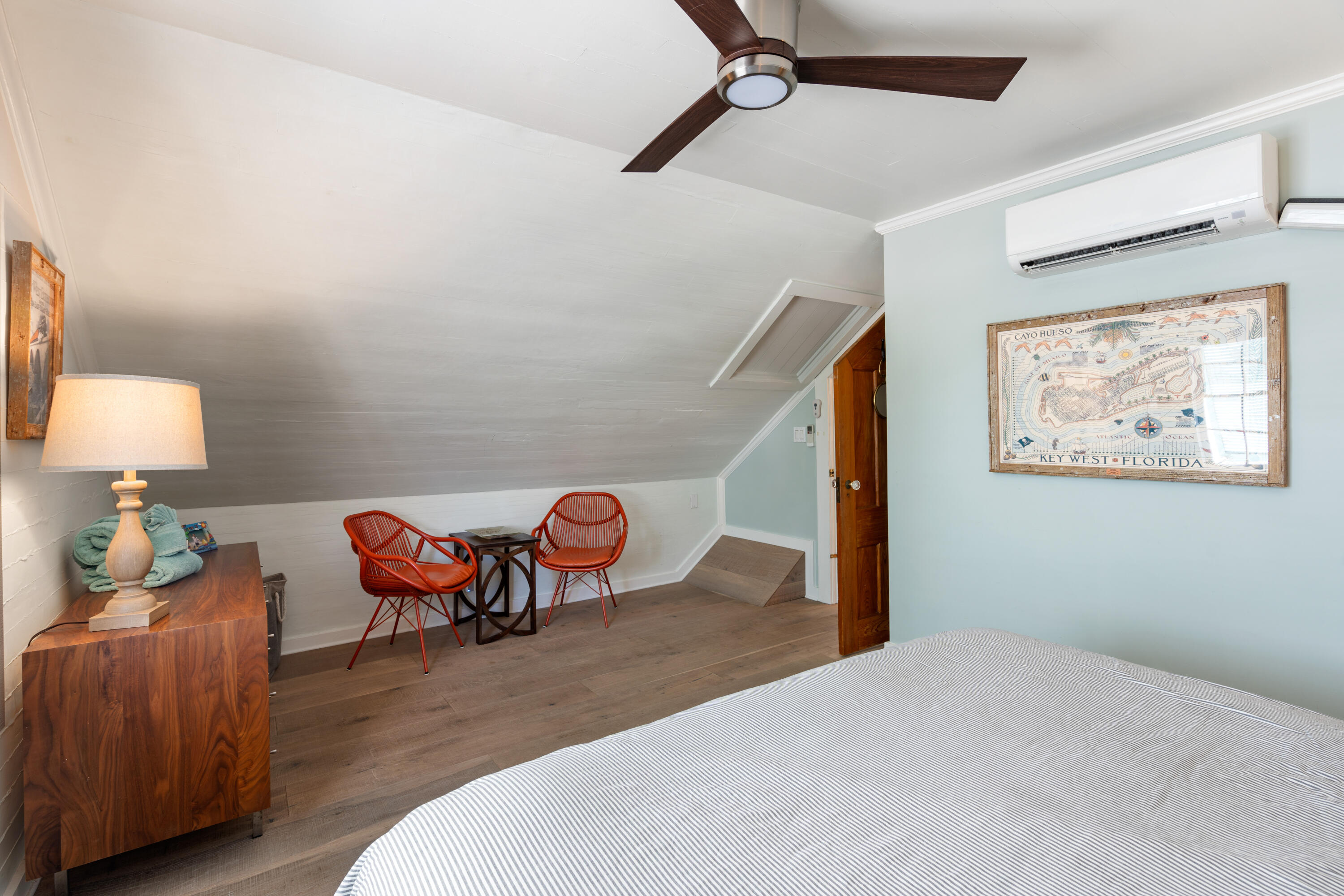 923 Eaton Street Key West, FL 33040 - Photo 19 of 42 a bedroom with furniture and a window