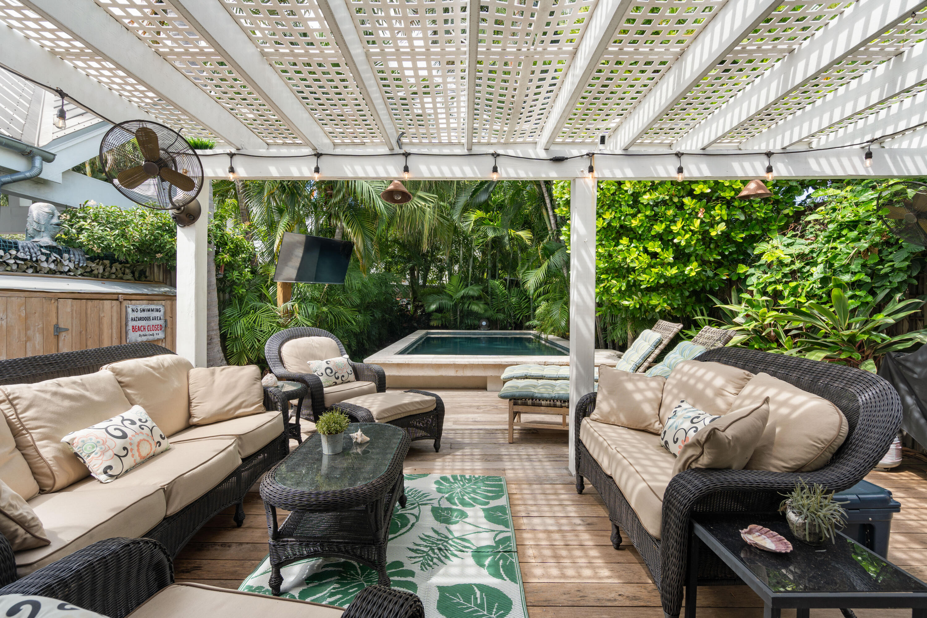 923 Eaton Street Key West, FL 33040 - Photo 33 of 42 a outdoor living space with furniture and garden view