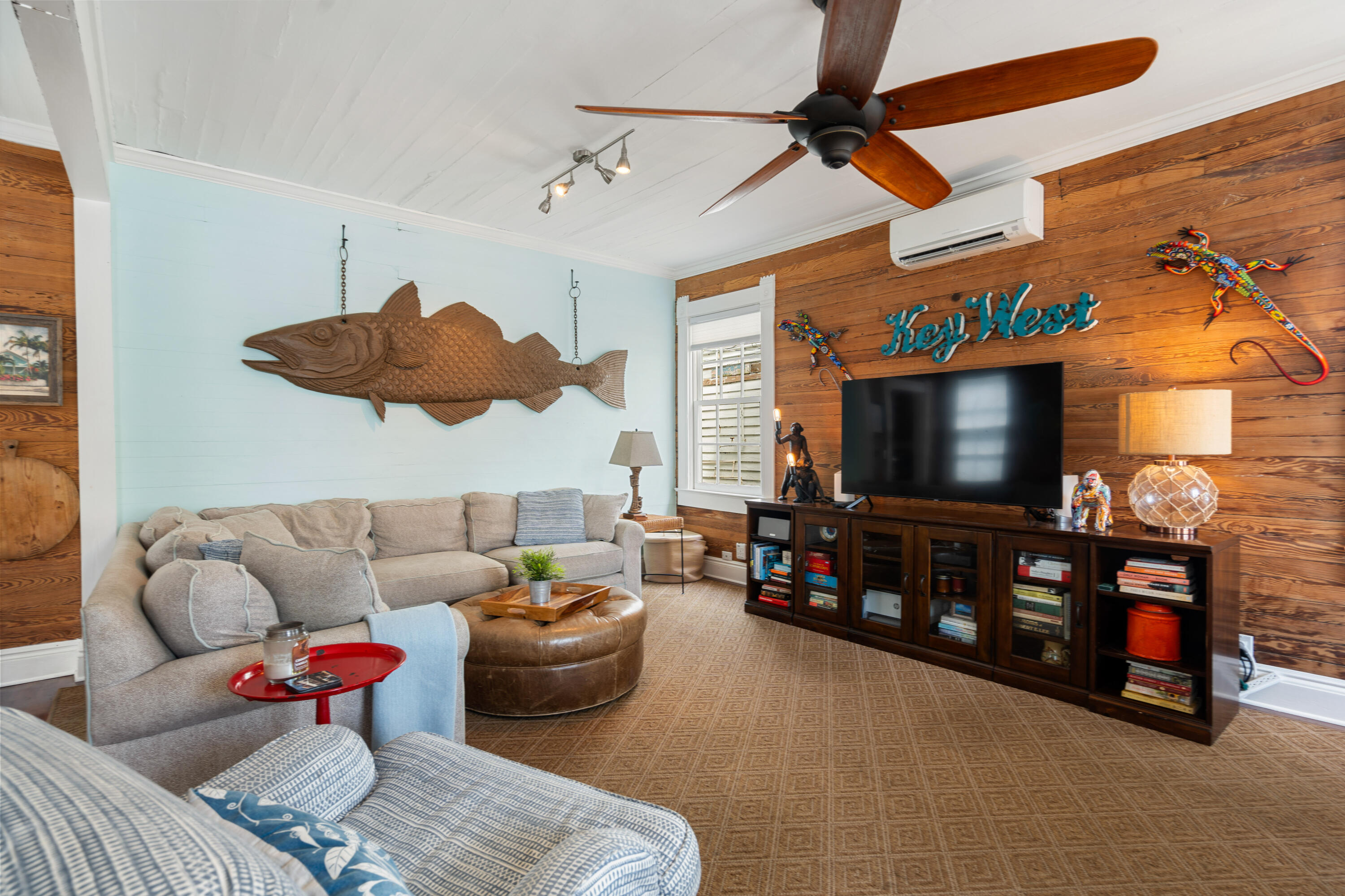 923 Eaton Street Key West, FL 33040 - Photo 8 of 42 a living room with furniture and a flat screen tv