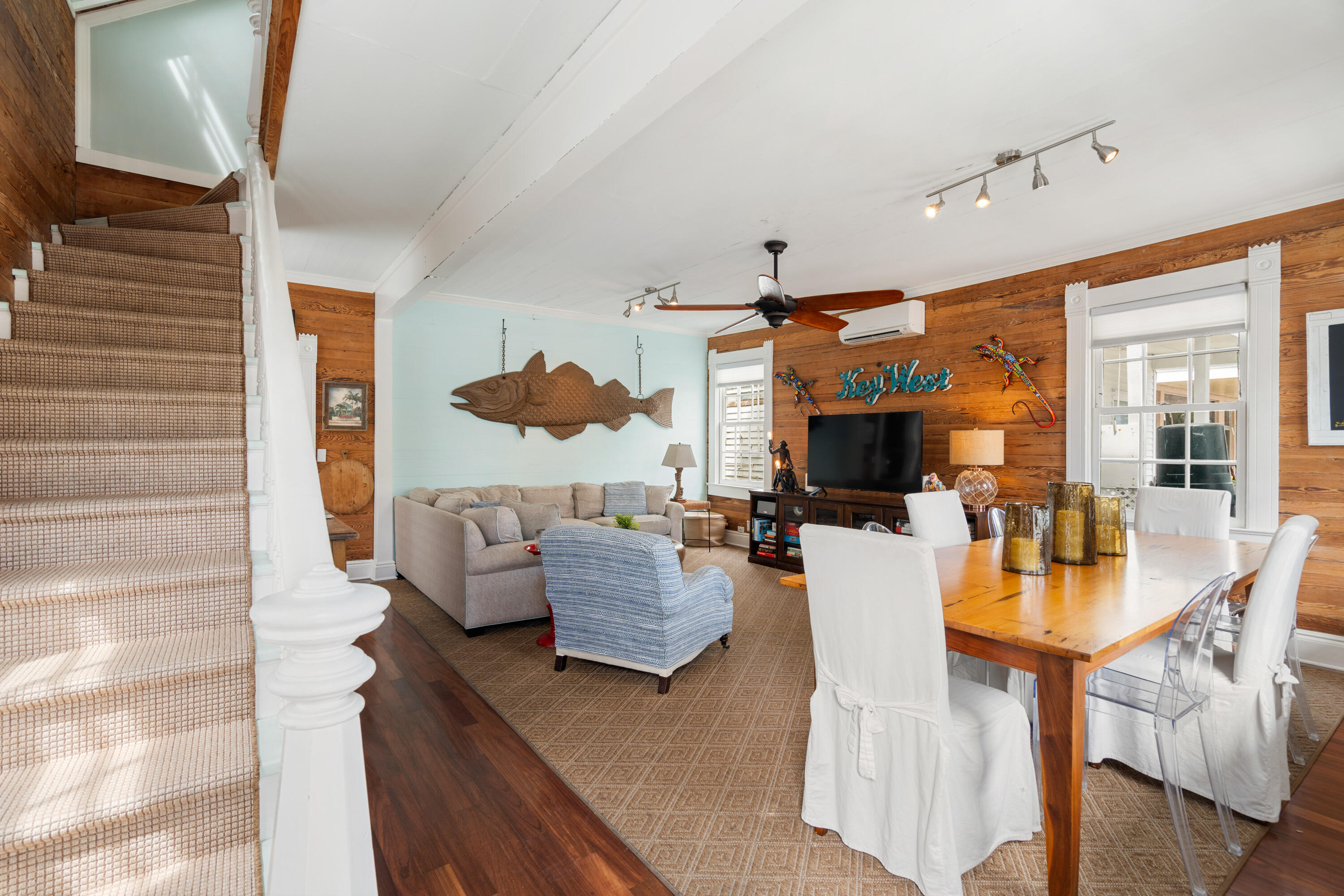 923 Eaton Street Key West, FL 33040 - Photo 10 of 42 a living room with furniture and a flat screen tv