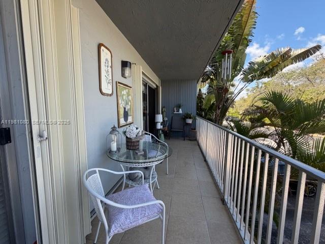 7403 Southwest 82nd Street, Unit 212N Miami, FL 33143 - Photo 2 of 10 a view of balcony and patio