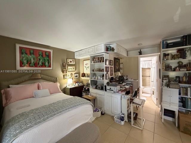 7403 Southwest 82nd Street, Unit 212N Miami, FL 33143 - Photo 8 of 10 a bedroom with furniture and a large window