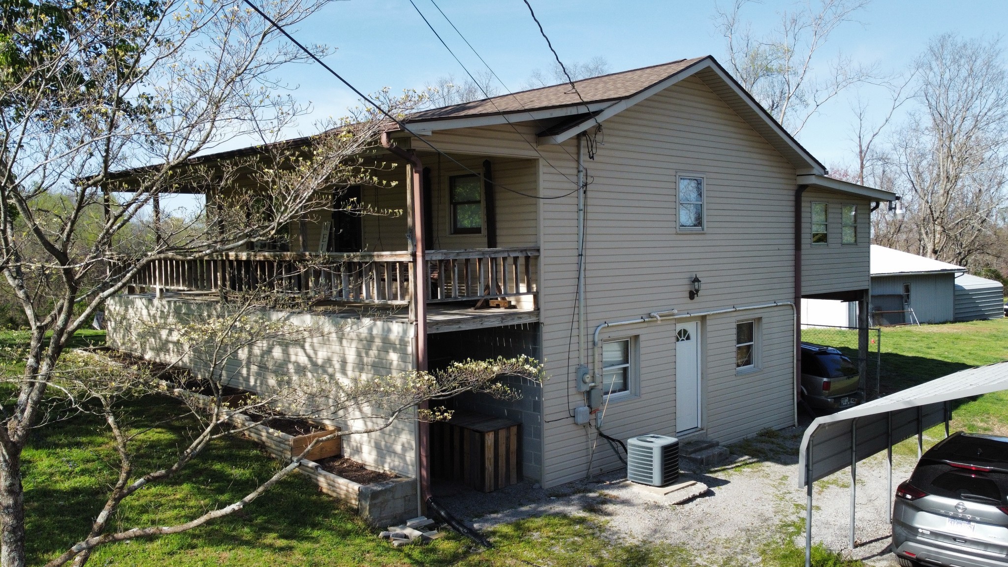 219 John Fuson Road Smithville, TN 37166 - Photo 12 of 84 a front view of a house with a yard