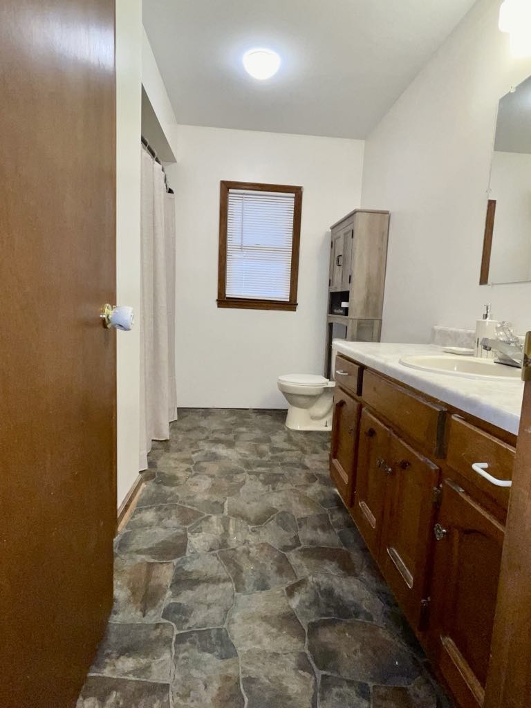 219 John Fuson Road Smithville, TN 37166 - Photo 30 of 84 a bathroom with a sink and a mirror