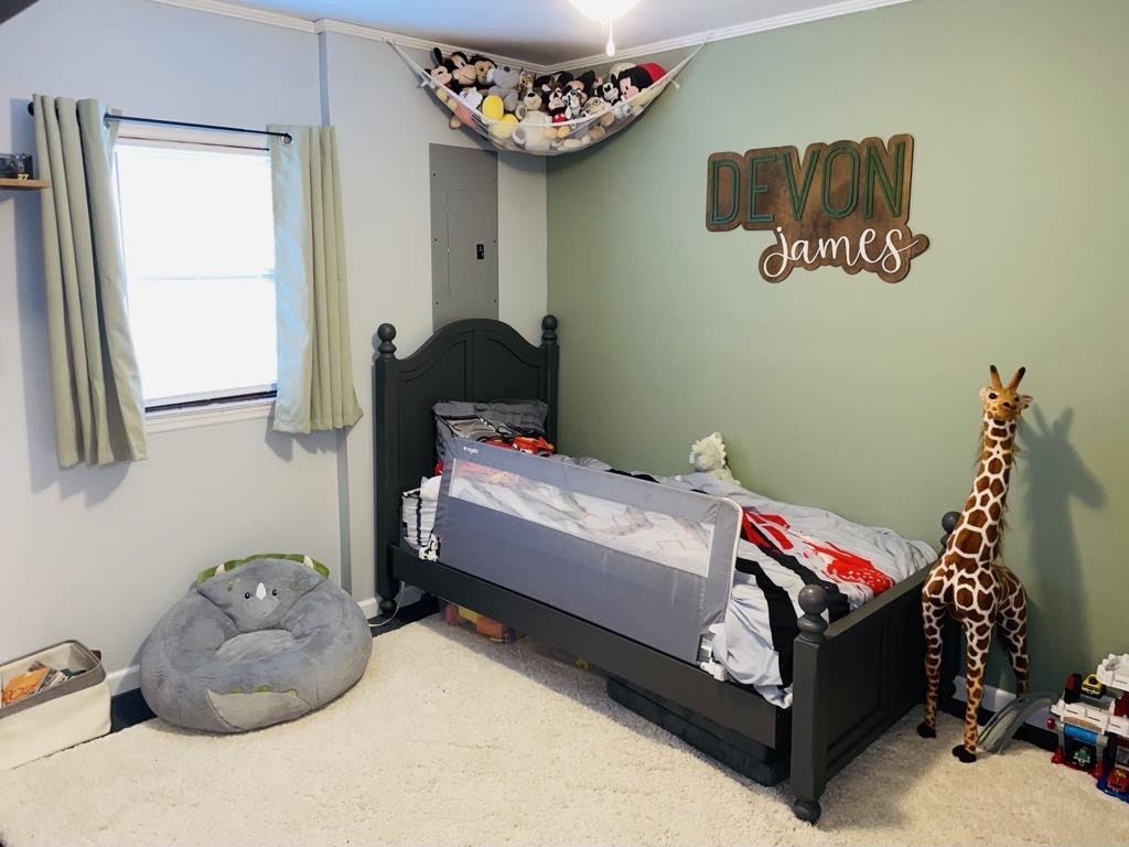 219 John Fuson Road Smithville, TN 37166 - Photo 33 of 84 a bedroom with a bed and a window