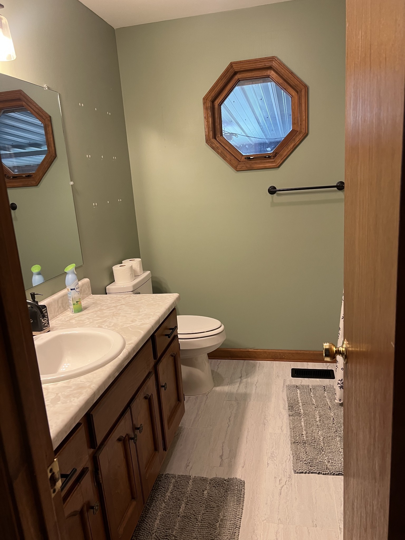 219 John Fuson Road Smithville, TN 37166 - Photo 58 of 84 a bathroom with a sink a toilet and mirror