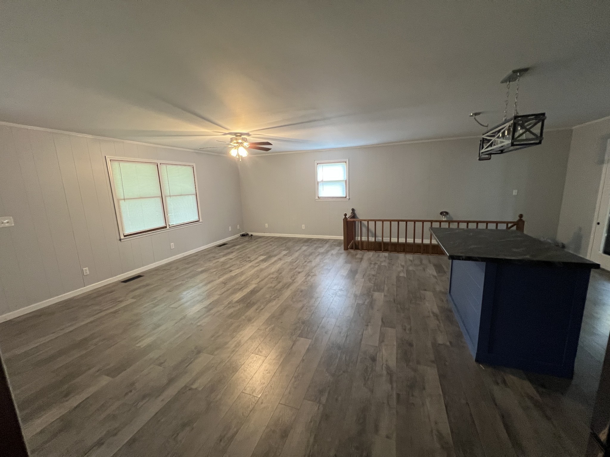 219 John Fuson Road Smithville, TN 37166 - Photo 61 of 84 an empty room with wooden floor and windows