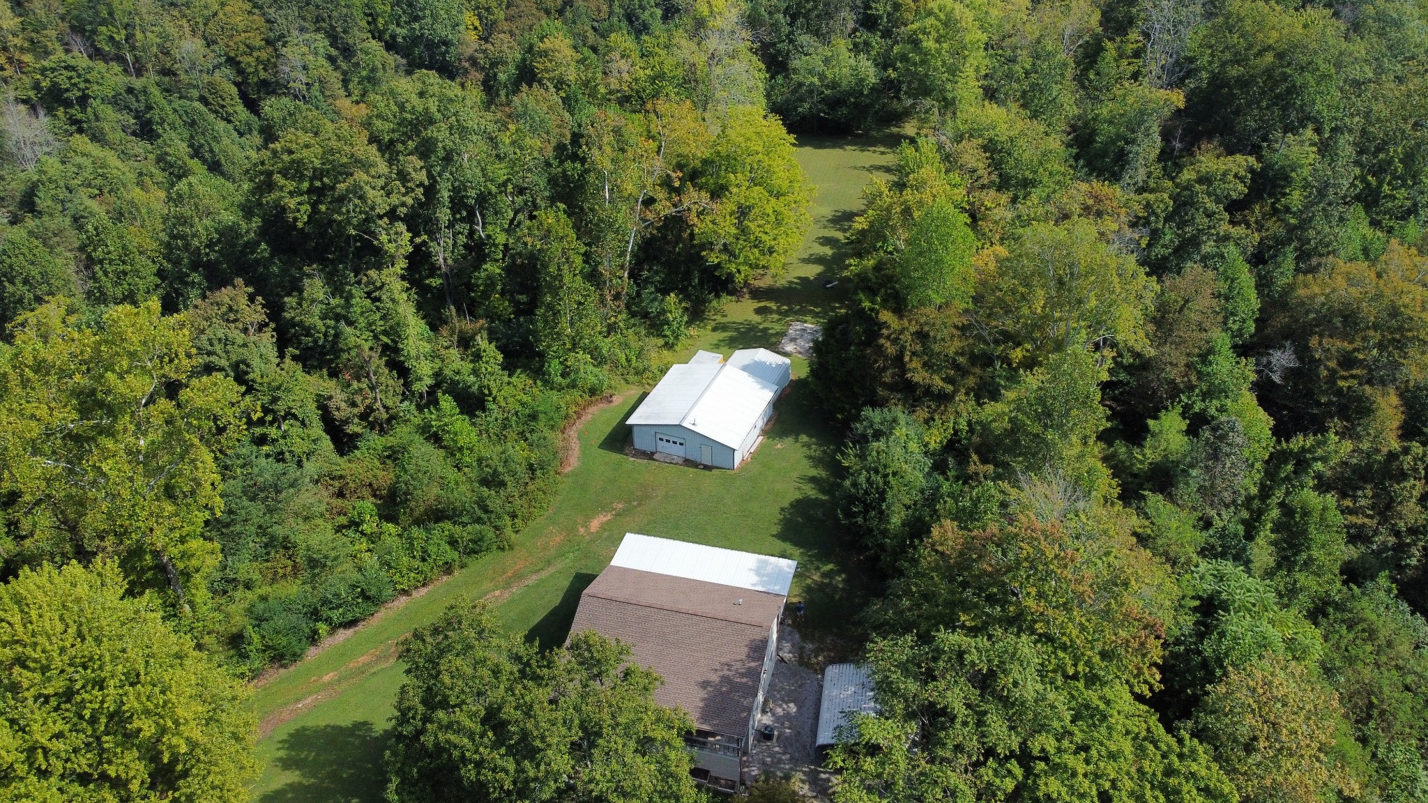 219 John Fuson Road Smithville, TN 37166 - Photo 74 of 84 an aerial view of a house with a yard