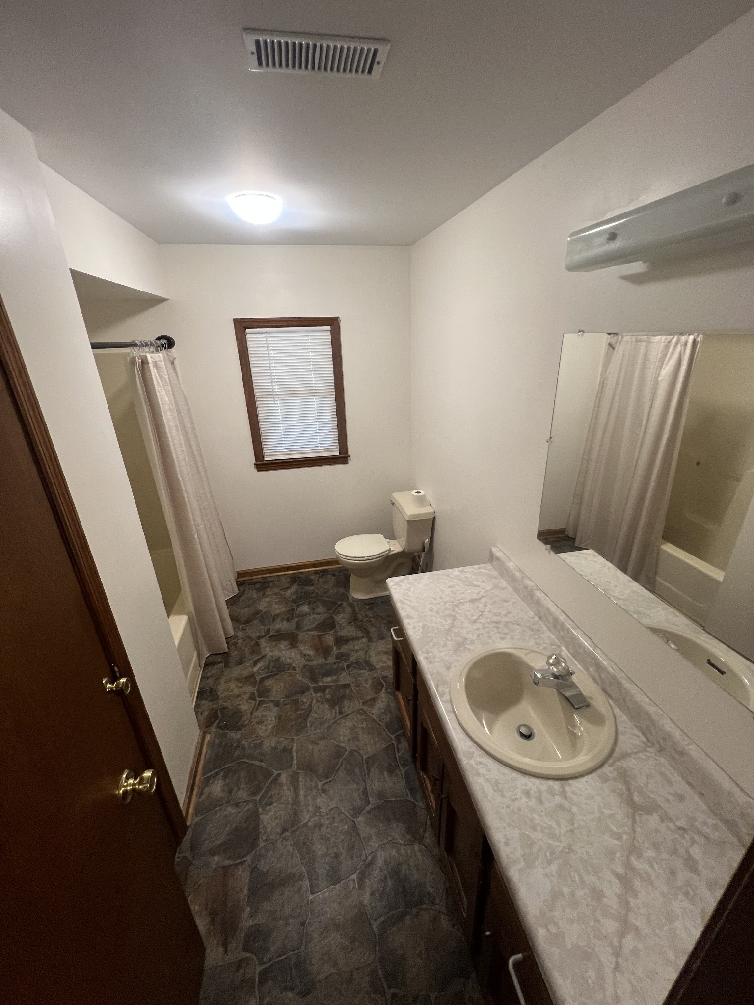 219 John Fuson Road Smithville, TN 37166 - Photo 81 of 84 a bathroom with a sink and a mirror