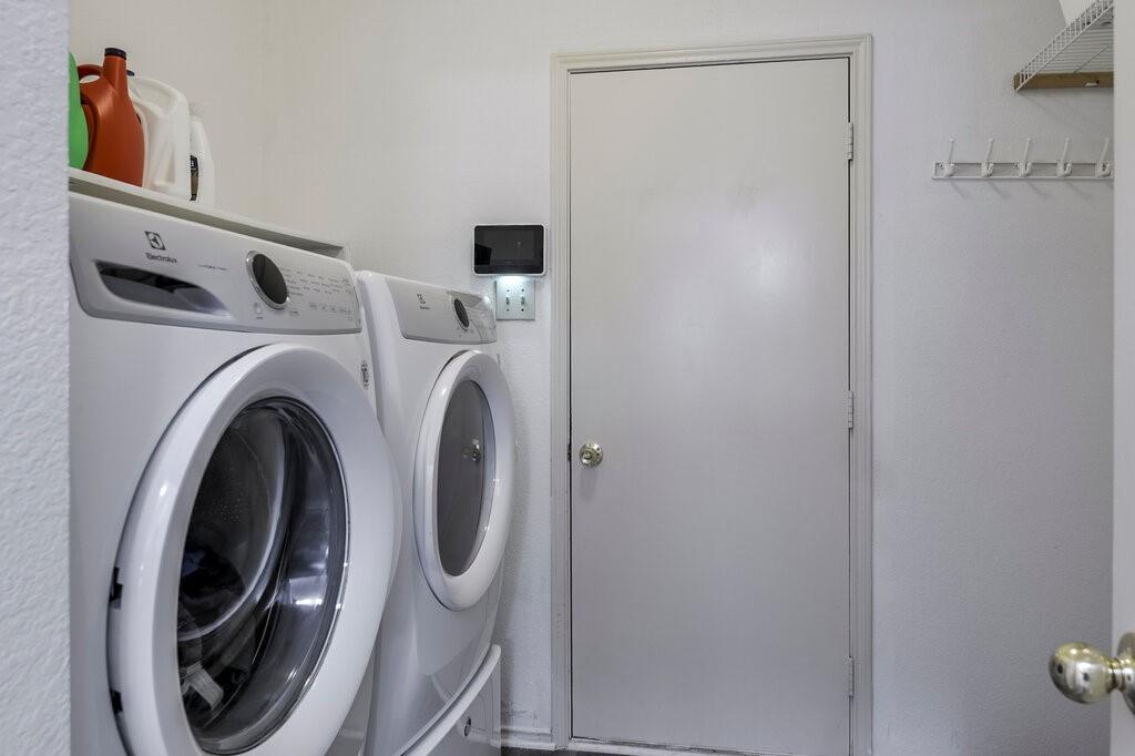 5428 Rolling Green Road Arlington, TX 76017 - Photo 23 of 29 Large laundry room has space for two high capacity appliances plus storage