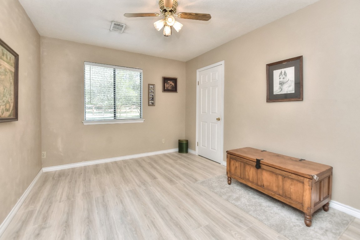6724 Outer Avenue Leander, TX 78641 - Photo 14 of 40 a view of room with window and ceiling fan