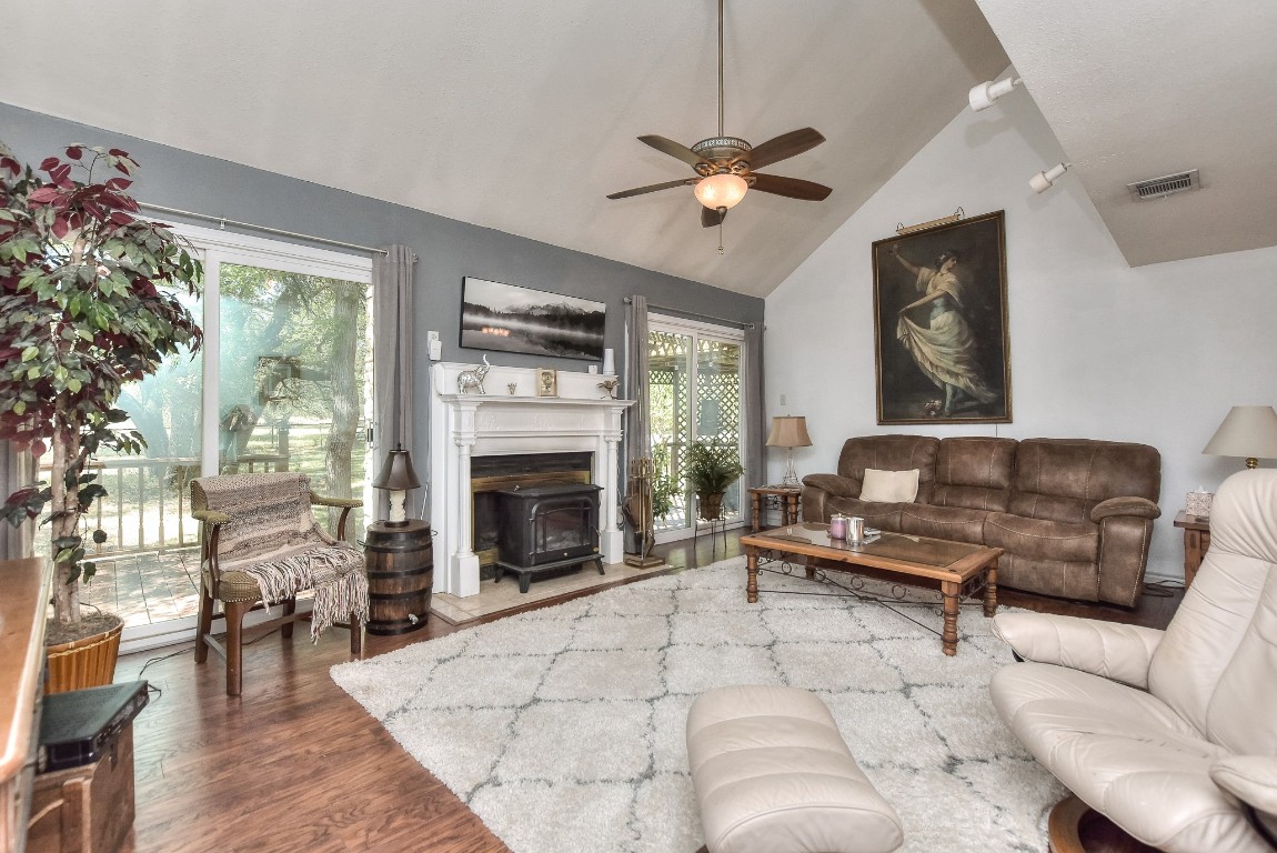 6724 Outer Avenue Leander, TX 78641 - Photo 9 of 40 a living room with furniture and a fireplace