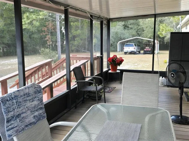 a view of a yard with a house