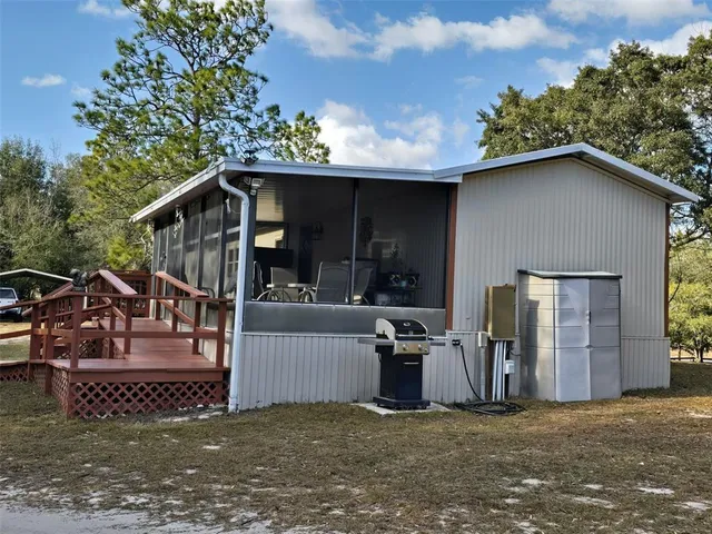 a view of a yard with a trees