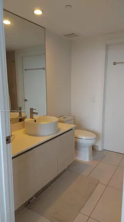a bathroom with a sink and a toilet