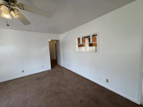 an empty room with windows