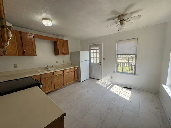 a view of a kitchen with electric equipment