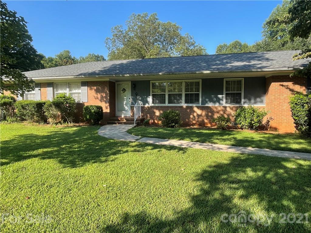 520 Neel Road Salisbury, NC 28147 - Photo 1 of 14 a front view of a house with garden and porch